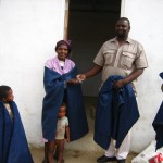 Fr Khoza hands over the keys to a new house owner in Wembezi, Archdiocese of Durban